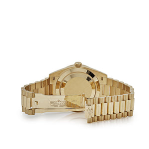 Rolex Day-Date 40 228398TBR Yellow Gold Onyx Baguette Diamond Dial Baguette Bezel — foto 6